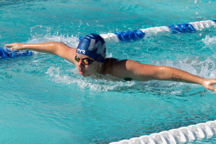 Willow Canyon student athlete competing in swim meet