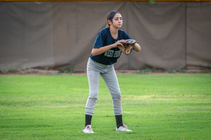 Softball player playing in game