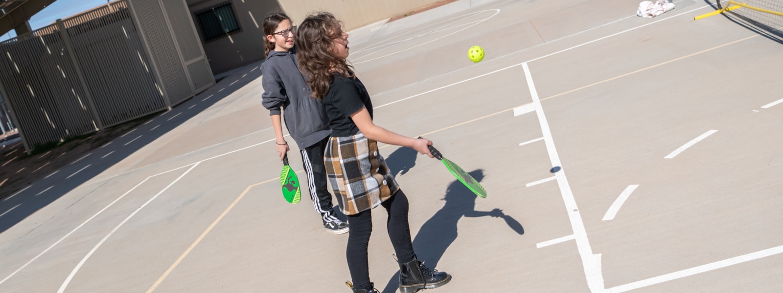 students playing pickleball