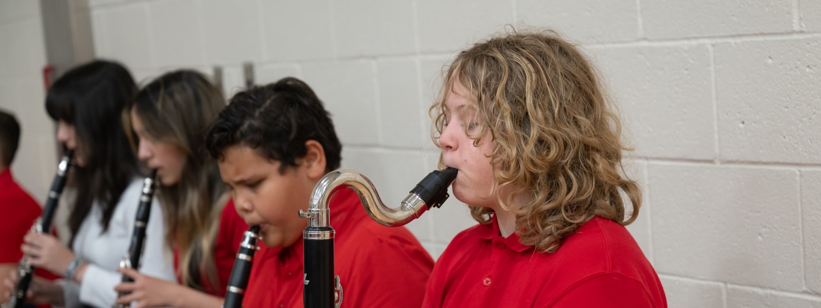 Students playing saxophone