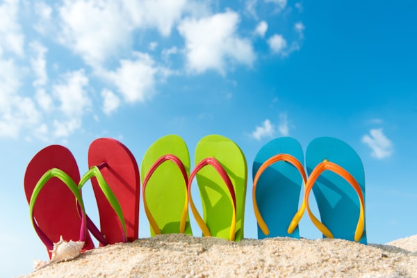 colorful flip flops on beach