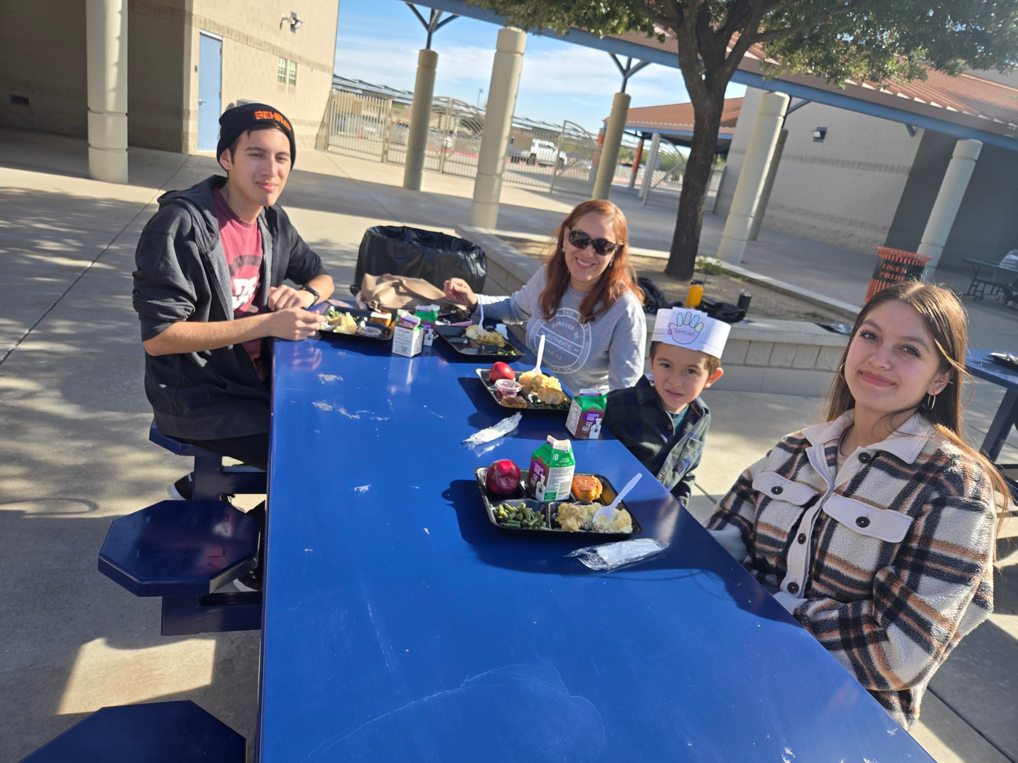 Family eating Thanksgiving Lunch.