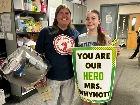 Mrs. Whynott with Hero award