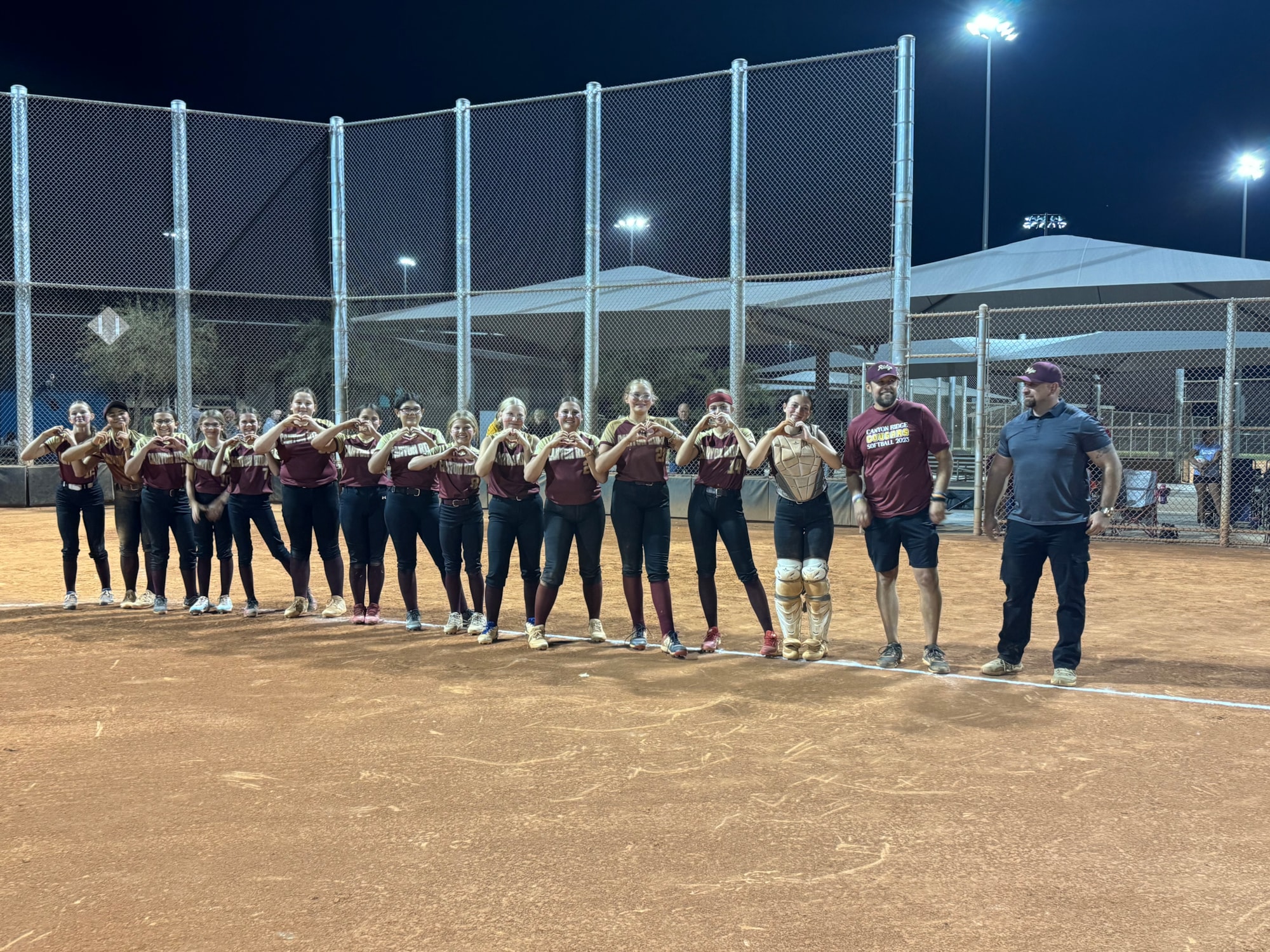 Softball Team standing in a line.