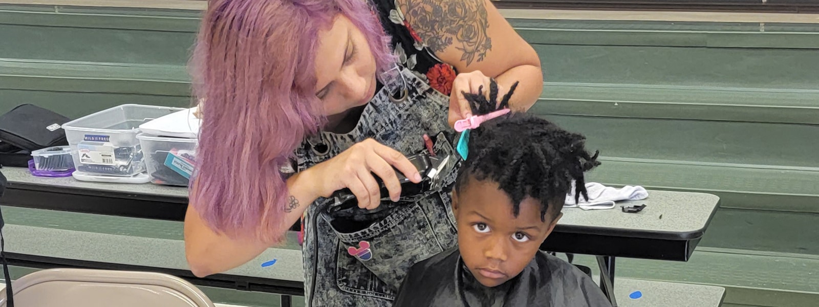 child getting a hair cut