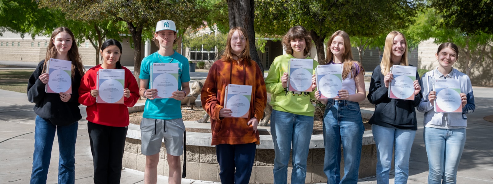 Willow Canyon Cambridge students pose with awards