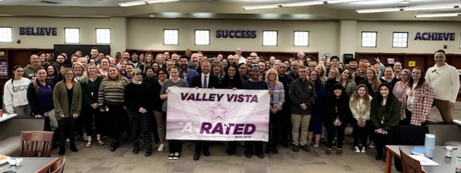 VVHS Staff with A Rated School banner
