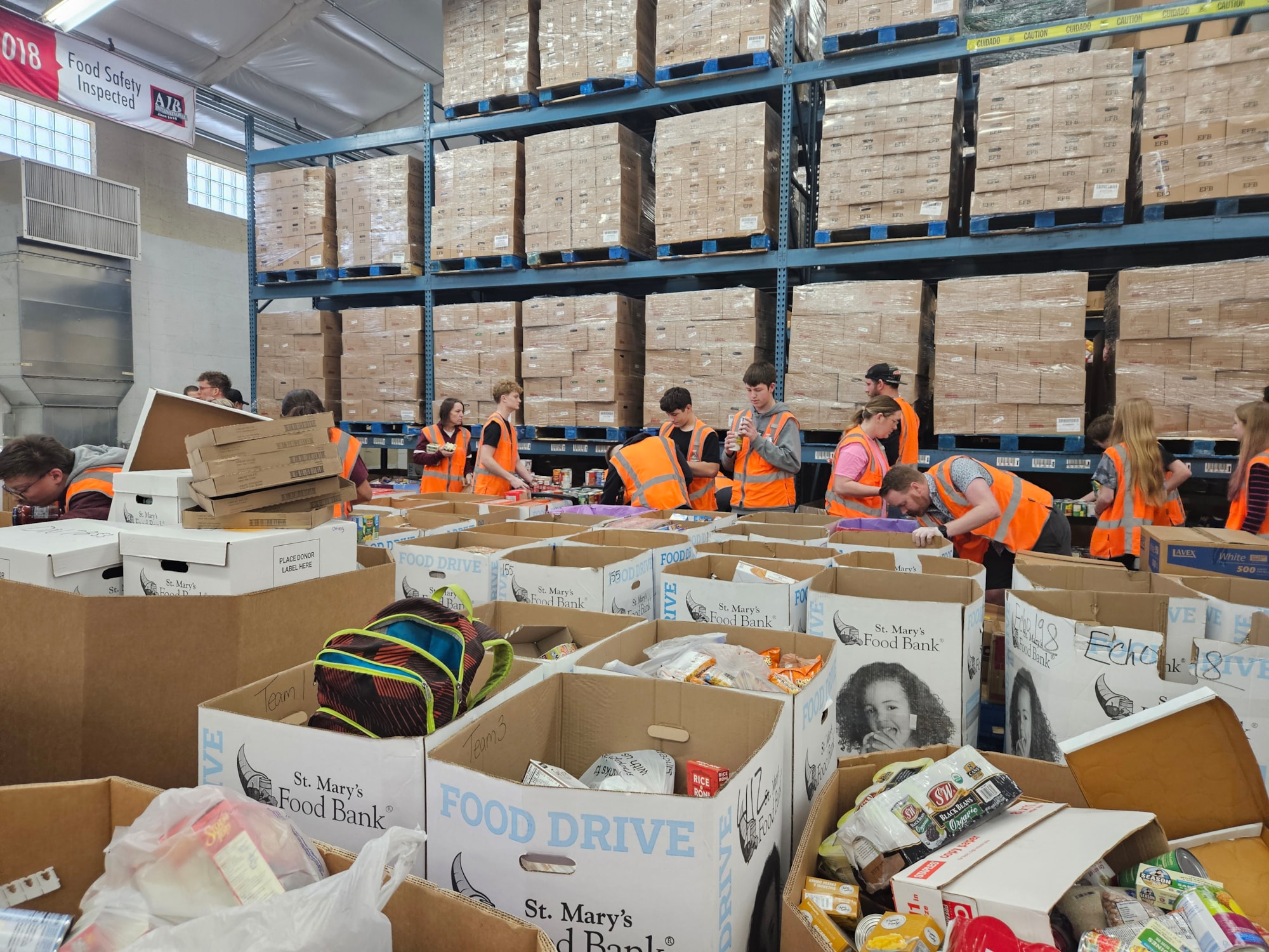 SRHS students assisting with sorting donated items at St. Mary's Food Bank