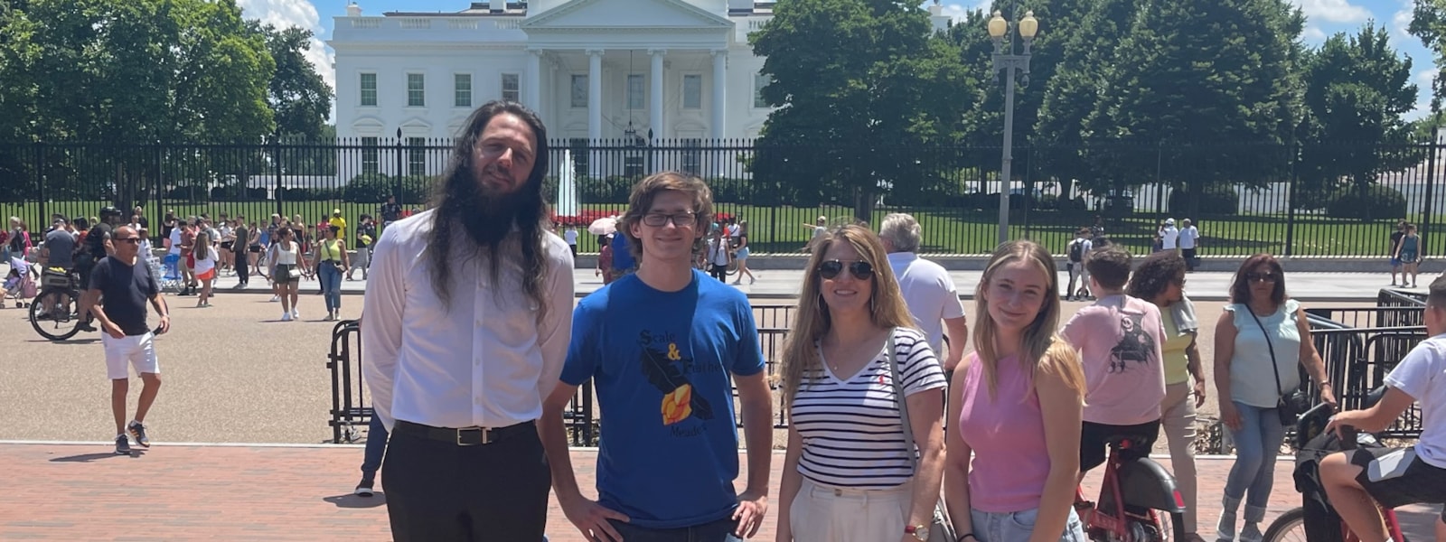 Shadow Ridge Educators Rising students Halle Feltner and Rhys Davis along with advisor Andrea Haser and chaperone Landon Earls pose for a photo in front of the White House in Washington, DC.