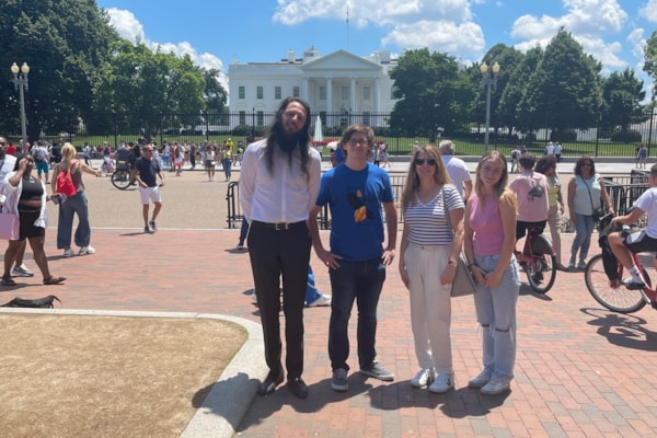 Shadow Ridge Educators Rising students Halle Feltner and Rhys Davis along with advisor Andrea Haser and chaperone Landon Earls pose for a photo in front of the White House in Washington, DC. 