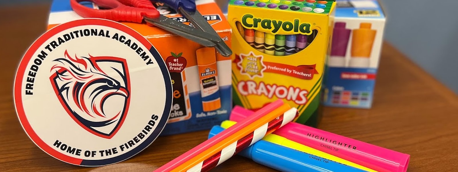 school supplies on desk 