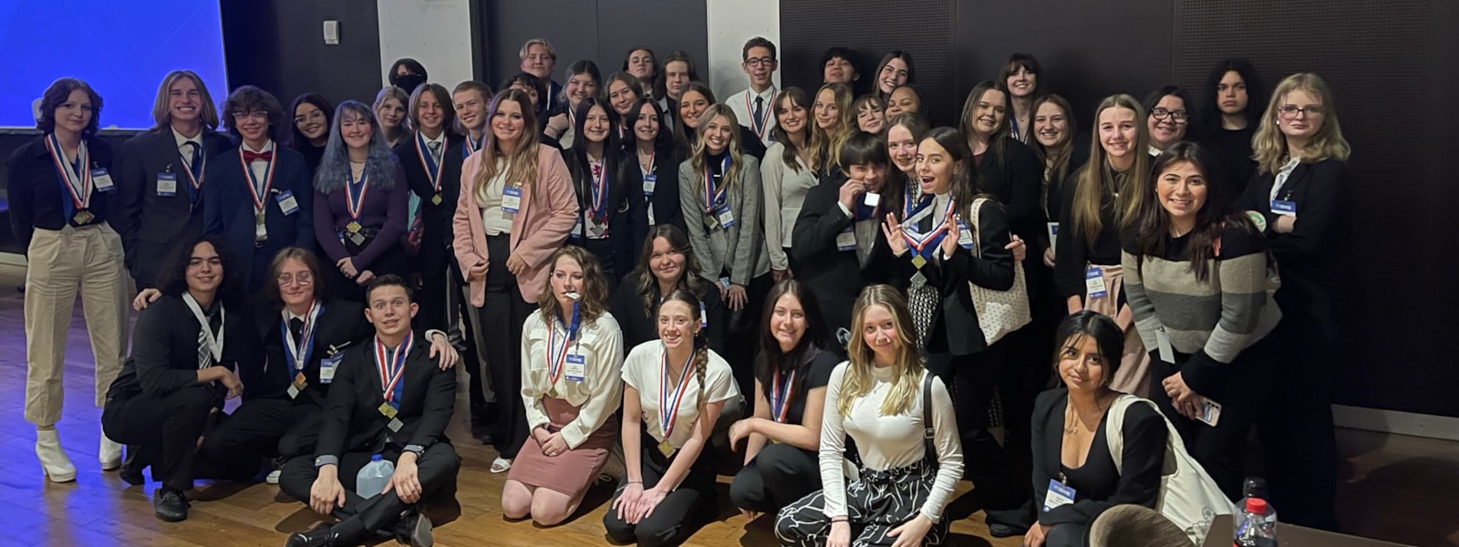 Shadow Ridge DECA students pose for group photo at state competition