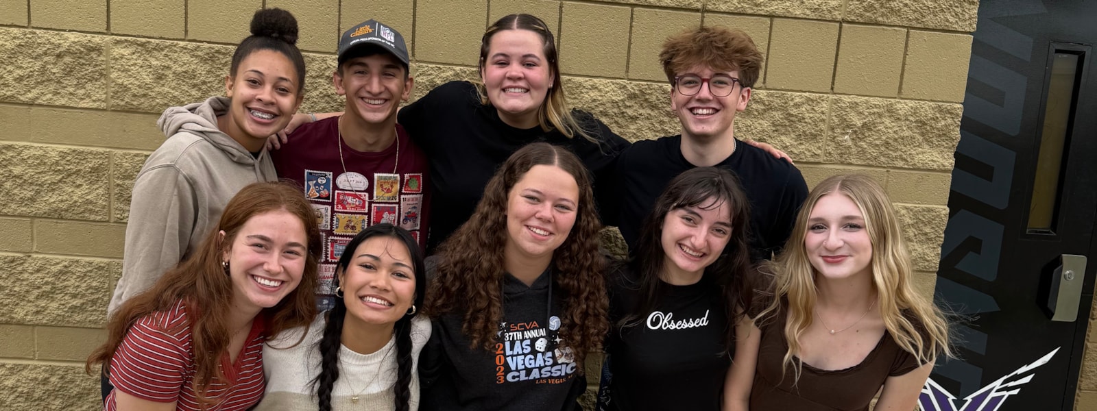 Students smile for camera